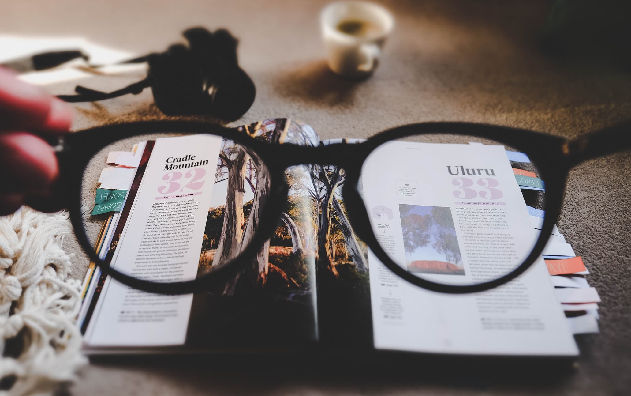 measuring ad effectiveness - looking through glasses at magazine